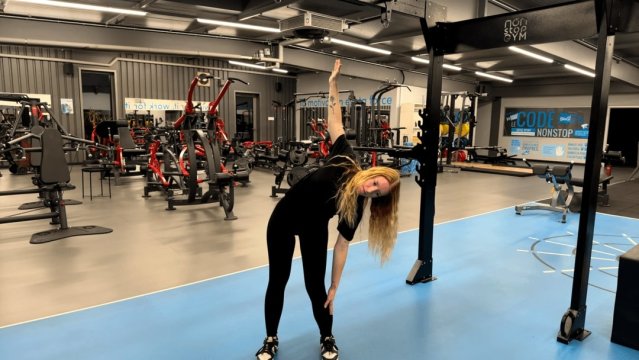 Étirement abdominal debout