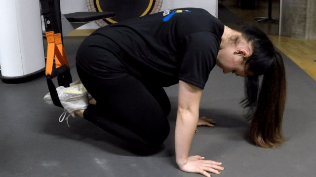 Crunch addominale TRX